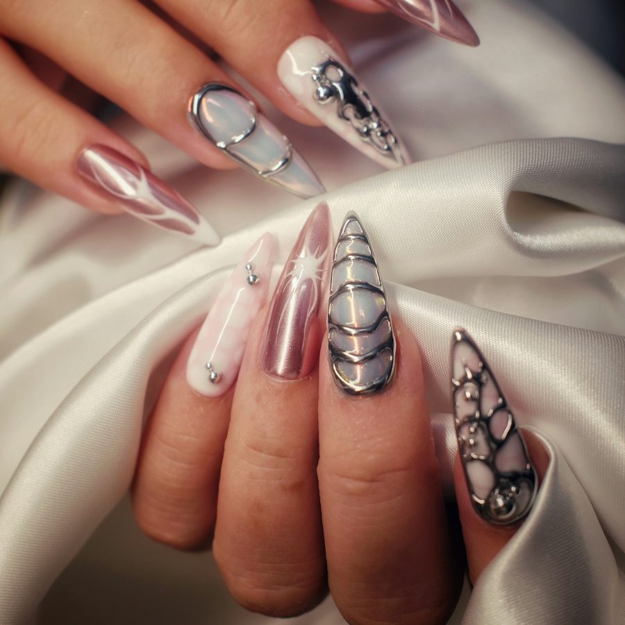 Metallic stiletto nails with gems