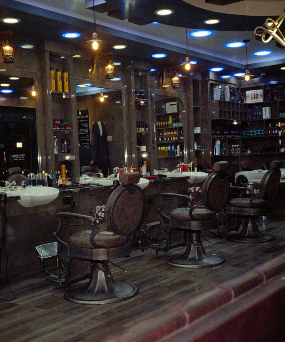 The barbershop with chairs and mirrors ready for the day