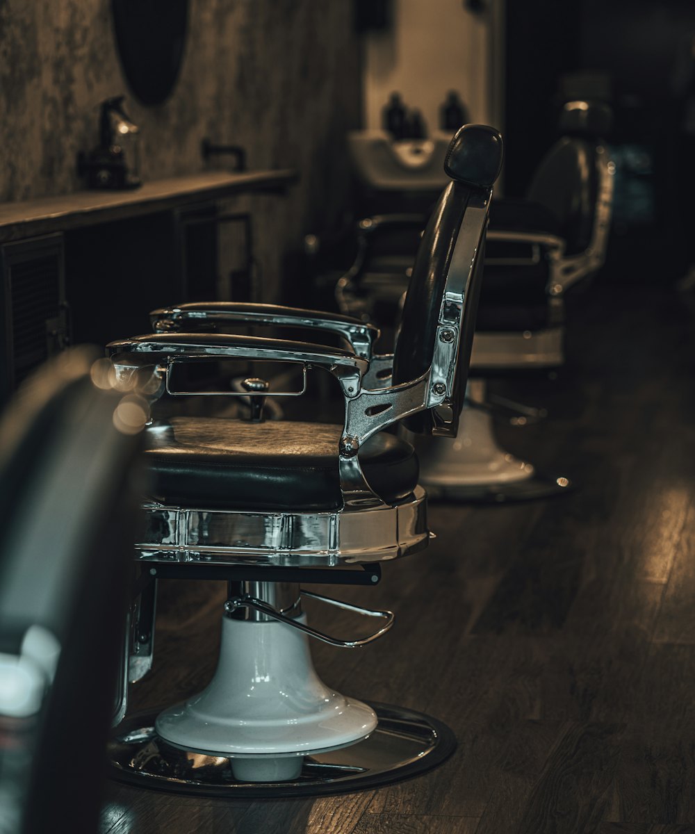 A classic black and chrome barber chair