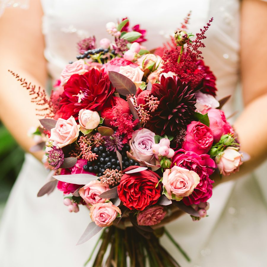 A bride holding her wedding bouquet
